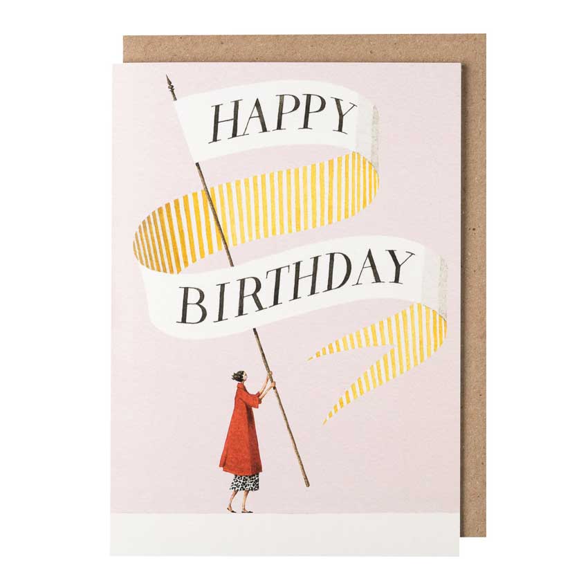 Grußkarte von Laura Stoddart: stilvolle Illustration einer Frau in rotem Mantel, die eine große Fahne mit der Aufschrift „Happy Birthday“ trägt. Elegante Geburtstagskarte mit feinen Details.